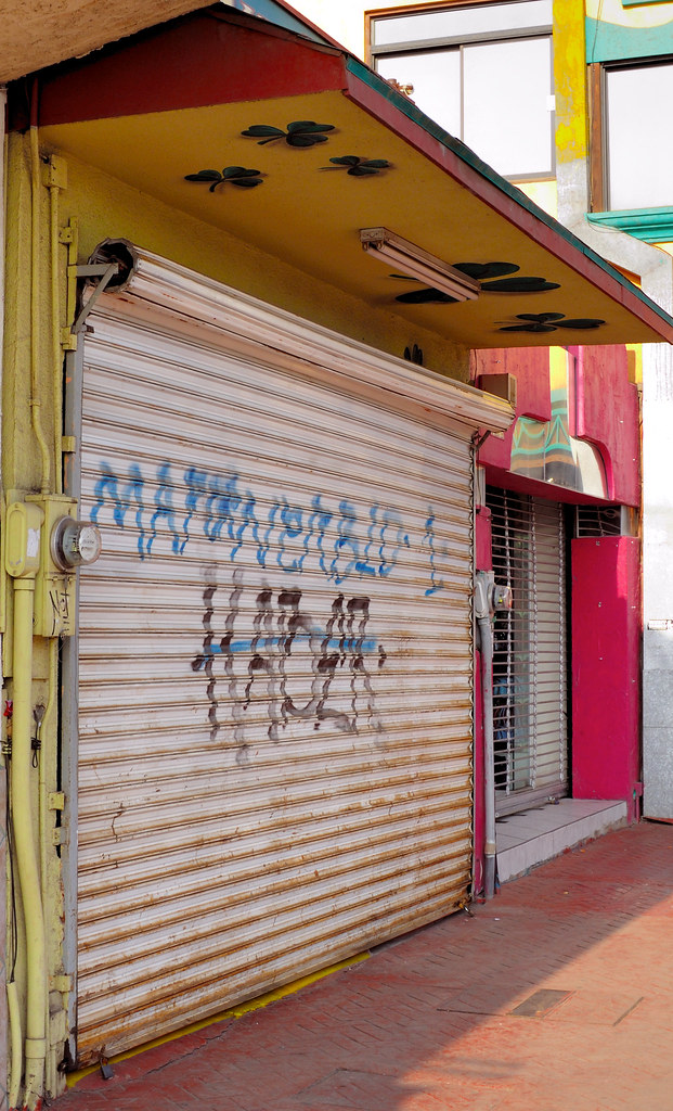 thay dây xích cửa cuốn